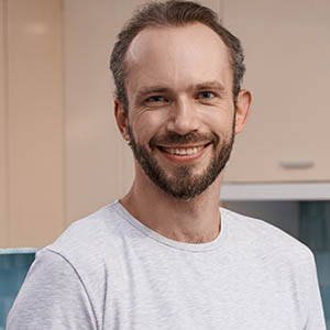 Contractor using a tablet to manage jobs